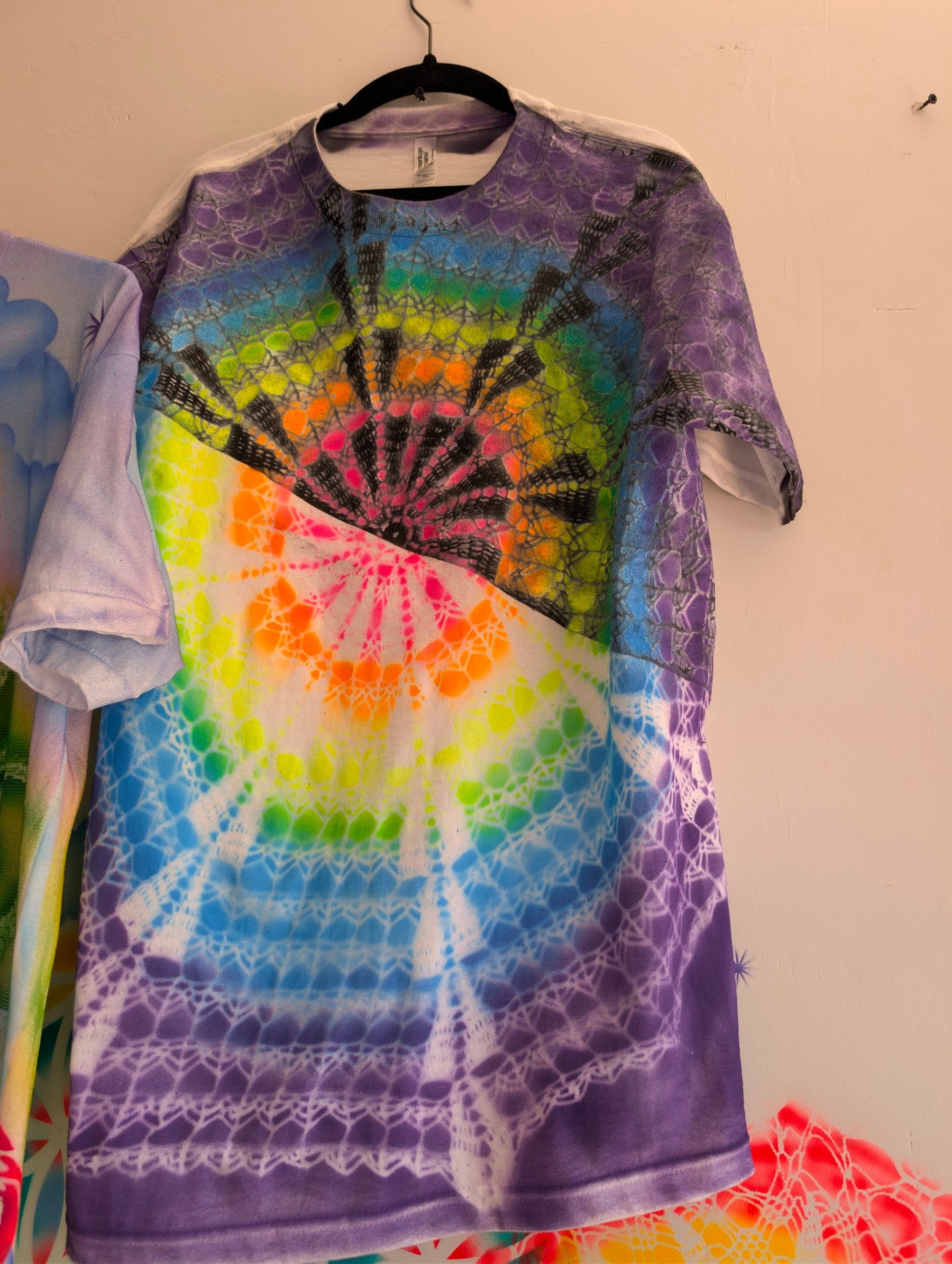 Purple hand-airbrushed shirt with a spectrum spiral by Star Shields
